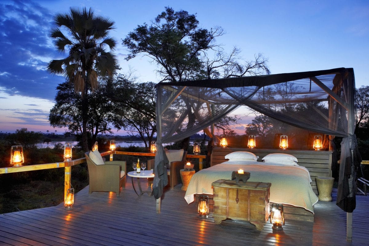 Abu Star Bed with lanterns at dusk